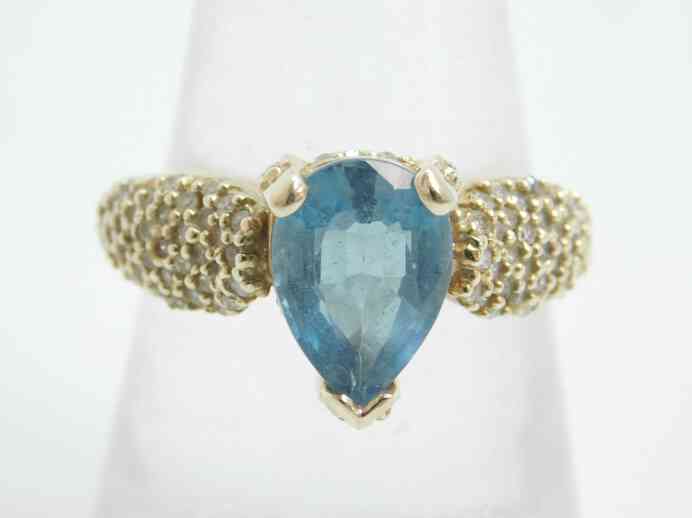 Gold Pear Shape Blue Topaz 0.49 CTTW Round 10K yellow gold size 9.25 ring