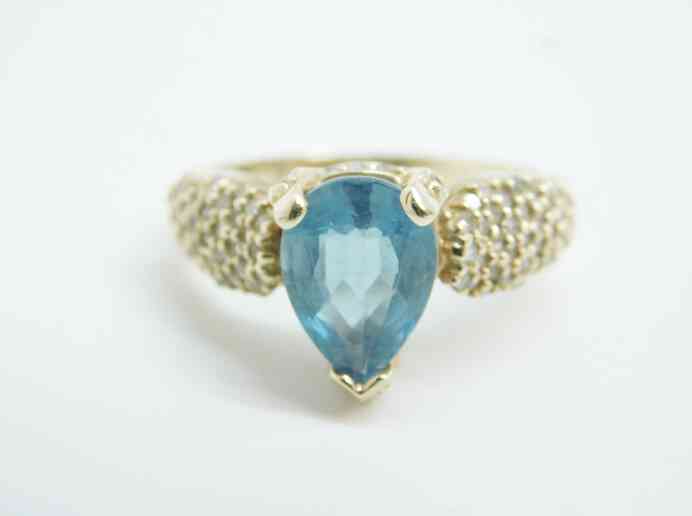 Gold Pear Shape Blue Topaz 0.49 CTTW Round 10K yellow gold size 9.25 ring