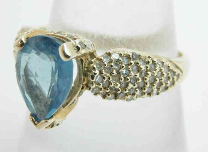 Gold Pear Shape Blue Topaz 0.49 CTTW Round 10K yellow gold size 9.25 ring