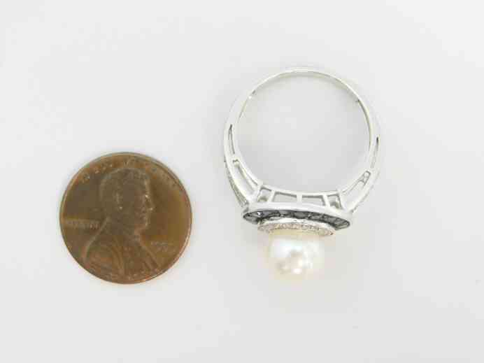 Art Deco designed diamonds and pearl statement ring